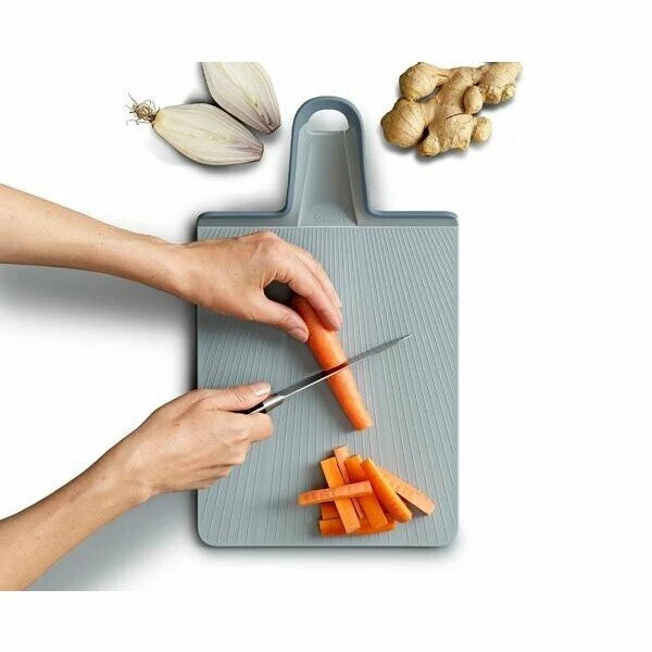 Joseph Joseph Schneidebrett Faltbar 37x21 Cm Chop2Pot Plus Blau 4 Joseph Joseph Schneidebrett Faltbar 37x21 Cm Chop2Pot Plus Blau – Bild 2